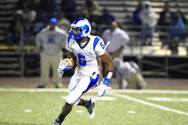 While returning a kickoff, Chesson looks up the field against Vashon in the Rams’ first playoff game. Chesson scored three times against Vashon including an interception returned for a touchdown and a 80 yard kickoff return. 