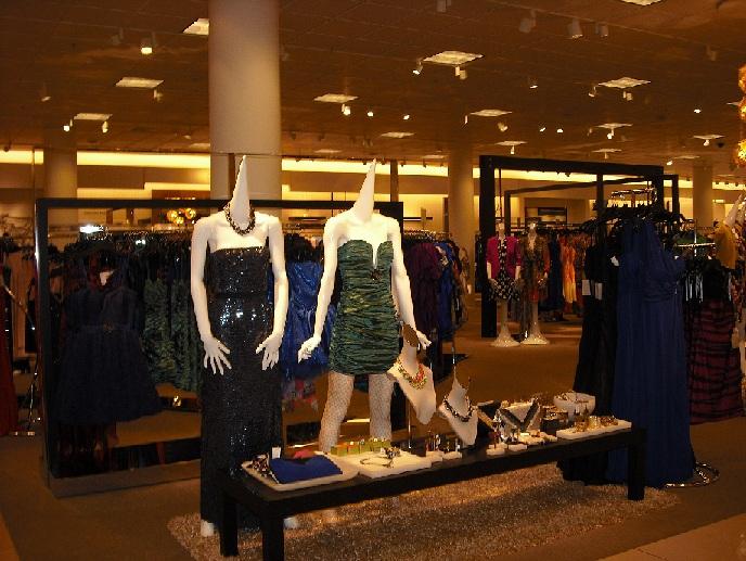 Near the front of the store, Nordstrom mannequin's display two of this season's Homecoming dresses. Expect to encounter an array of neutrals and blues in the pricey department store.