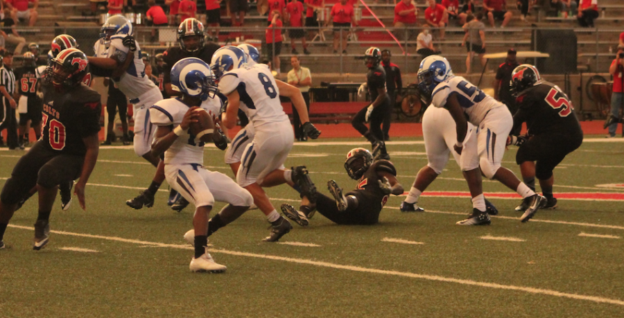 Quarterback Jordan Jackson looks deep downfield for an open receiver. 