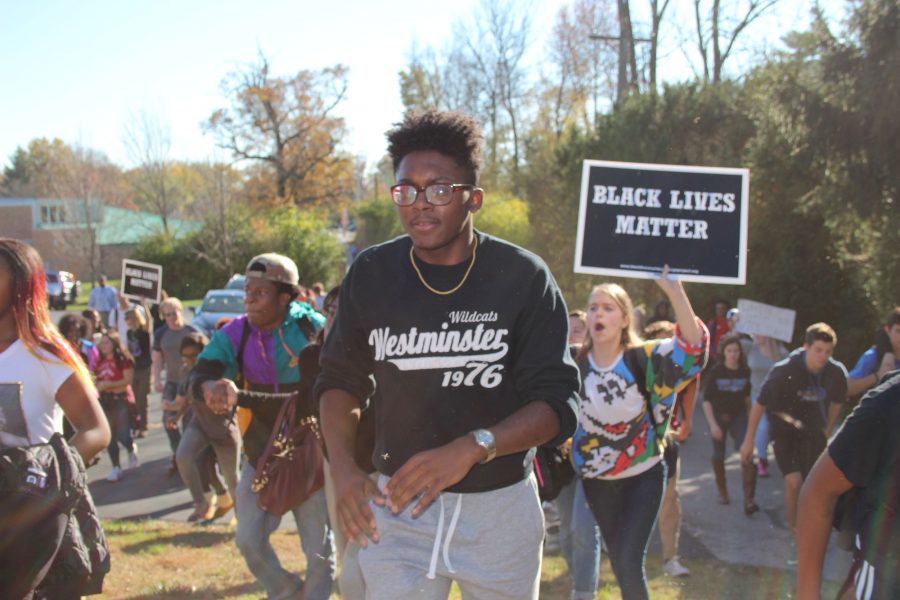 Sophomore Taji Barr walks onto the hill to get to the Administrative Center. 