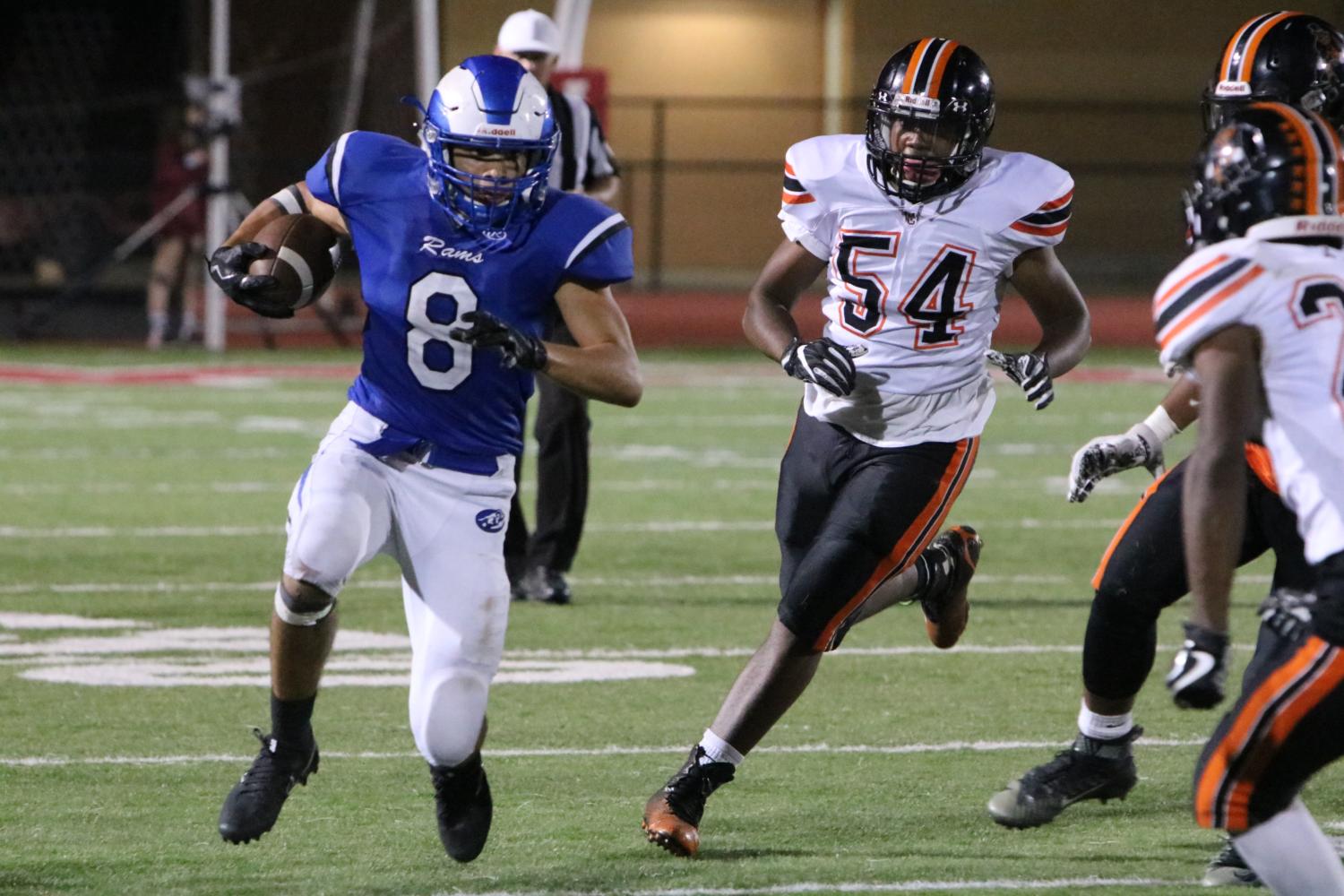 Running back Andrew Hunt barrels through the Webster defense. 