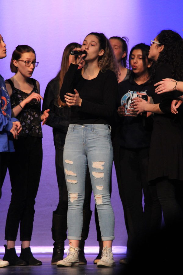 Habitat for Humanity hosted their seventh annual "Mr. Ladue" contest on March 13th. Junior Menea Kefalov performs her solo, "When We Were Young" by Adele, with the rest of Viva Voce. 