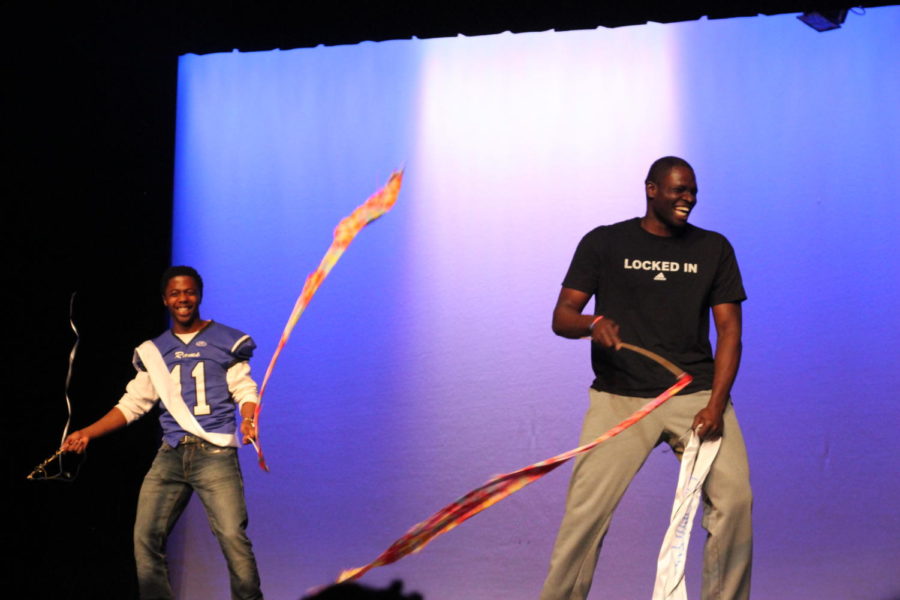 Habitat for Humanity hosted their seventh annual "Mr. Ladue" contest on March 13th. Senior Jordan Jackson (Left) and Junior Moses Okpala (right) twirl ribbons during the battle round.