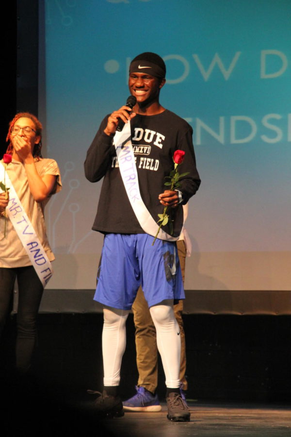 Habitat for Humanity hosted their seventh annual "Mr. Ladue" contest on March 13th. Semi-finalist Dale Chesson (11) smiles as he responds to his last question.