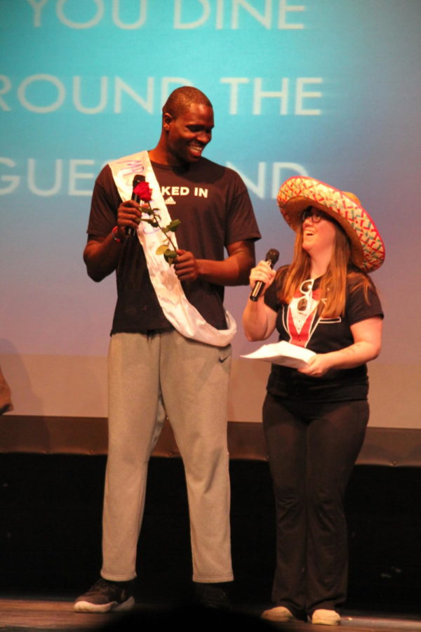Habitat for Humanity hosted their seventh annual "Mr. Ladue" contest on March 13th. Junior Moses Okpala answers his final question.