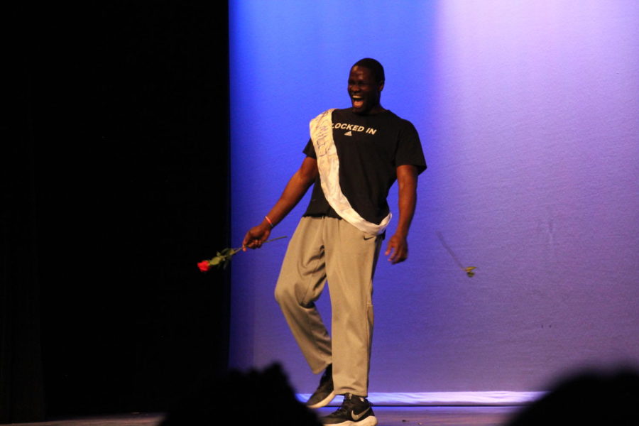 Habitat for Humanity hosted their seventh annual "Mr. Ladue" contest on March 13th. Junior Moses Okpala laughs as he performs during the lip sync battle.