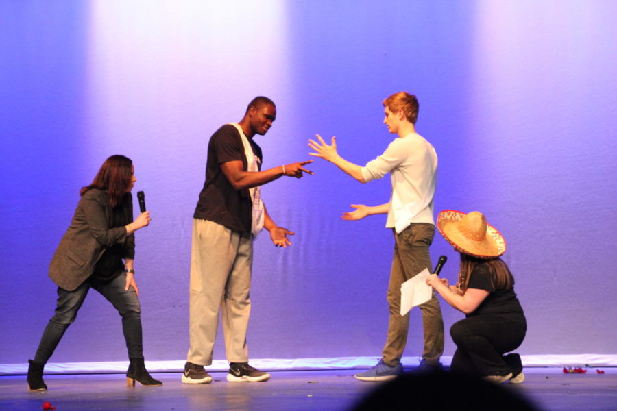 Habitat for Humanity hosted their seventh annual "Mr. Ladue" contest on March 13th. Due to a lack of decision making by the judges, Moses Okpala (left) and Reid Rogers (right) play rock, paper, scissors to determine who will be awarded "Mr. Ladue". 