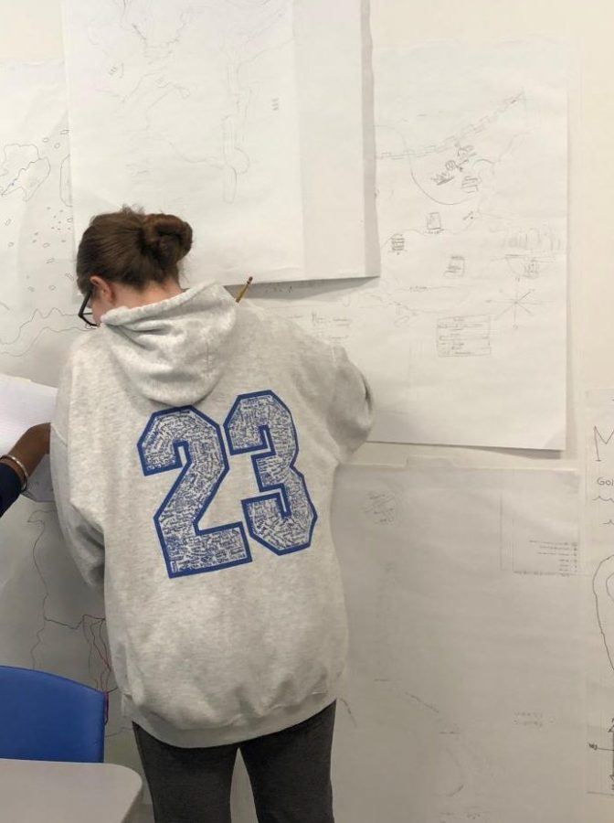 Alexis Monsey (9) works on her map during freshman World Studies. The class was learning about the eight specific features of civilizations. "I was labeling and drawing a map of European civilizations," Monsey said. 