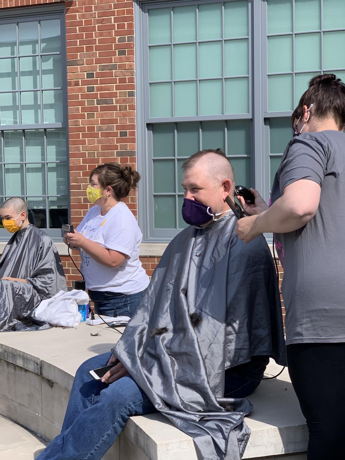 Just a Little Off the Top: Dougan Shaves Head in his Sister's Honor