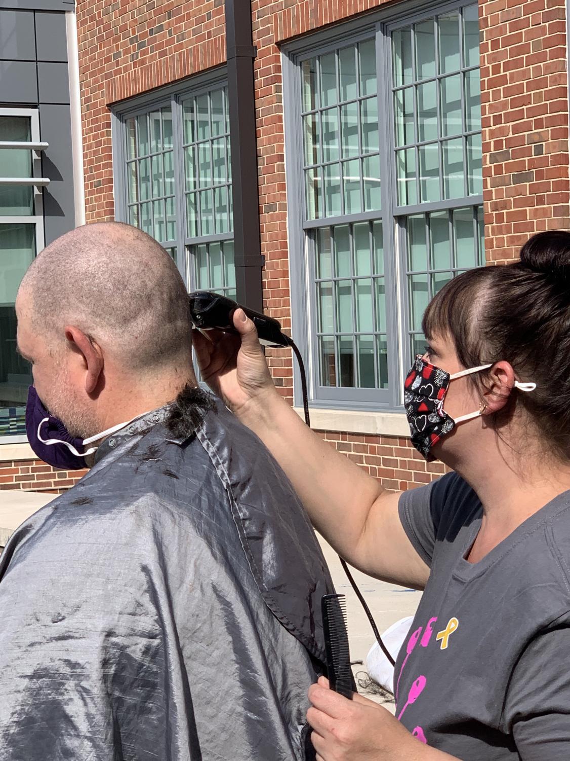 Just a Little Off the Top: Dougan Shaves Head in his Sister's Honor