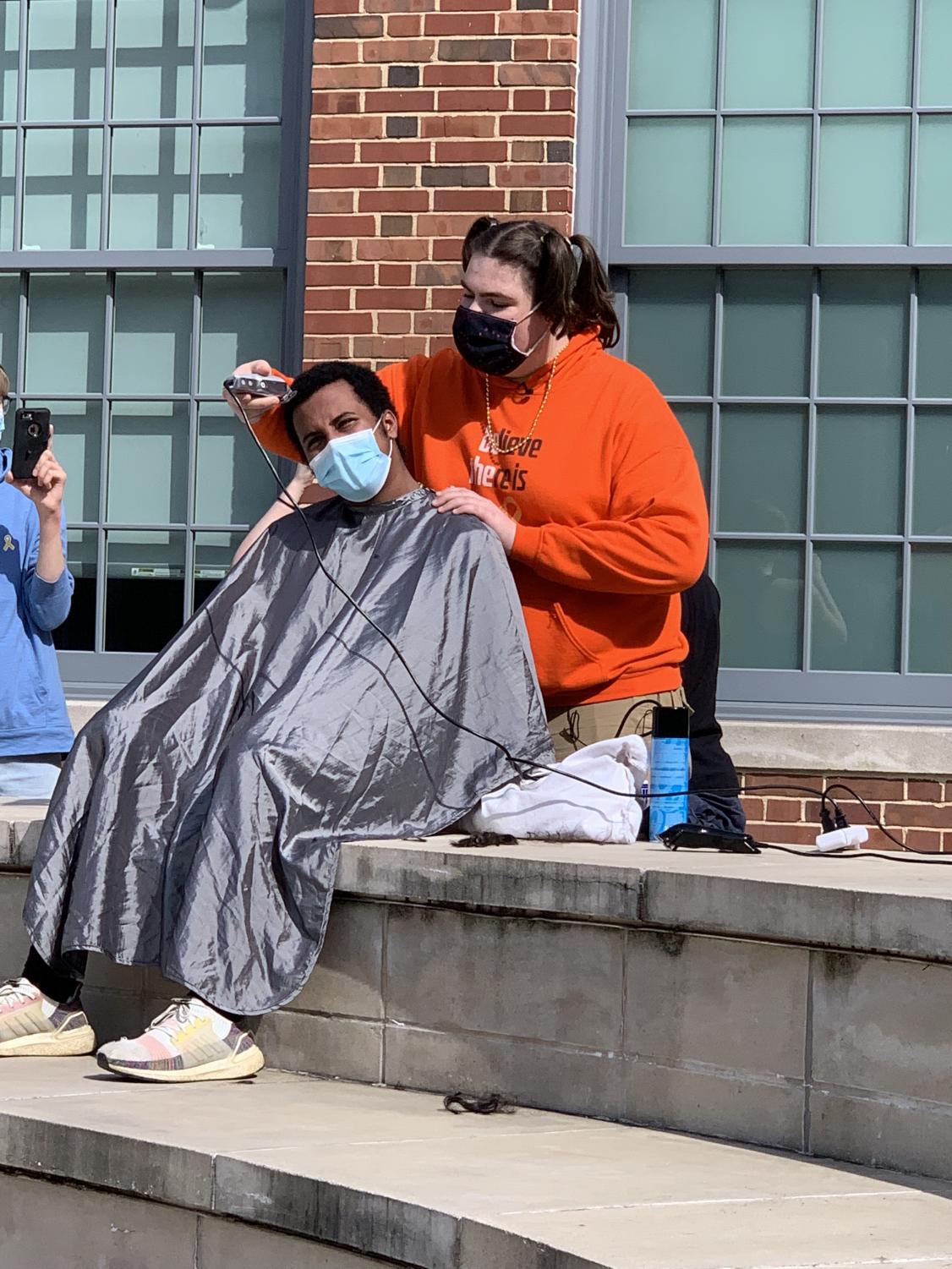 Just a Little Off the Top: Dougan Shaves Head in his Sister's Honor