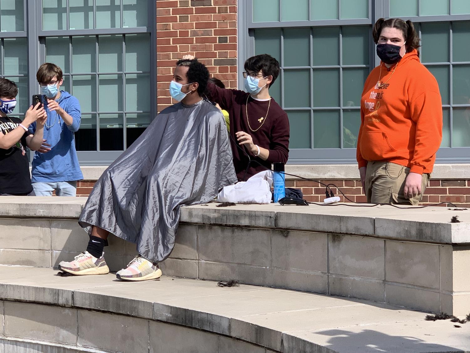 Just a Little Off the Top: Dougan Shaves Head in his Sister's Honor