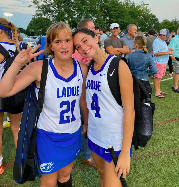 Seniors Julia Tullman (right) and Molly Katzman (left) pose after a game. 