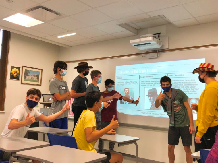 A group of history club members present at a club meeting. Students can expect this at a typical history club meetings. "We have small lectures and often have fun activities revolving World History," president Tenny Dibooglu said.