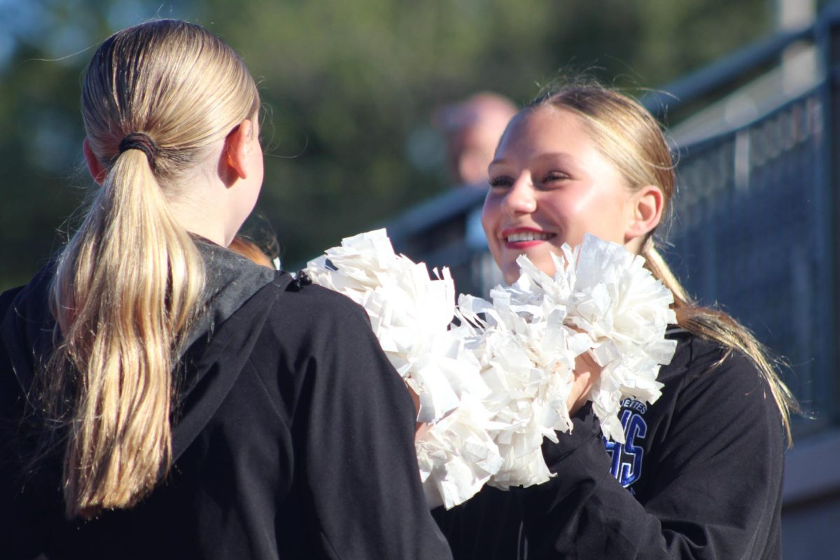 Ava Leidenfrost (11) smiles in her Laduette attire while performing at a football game. Although her health with Type 1 Diabetes doesn’t depend on an active lifestyle, Leidenfrost continued to do so anyways. “[Exercise] is important, but it doesn’t really have to do with diabetes,” Leidenfrost said.