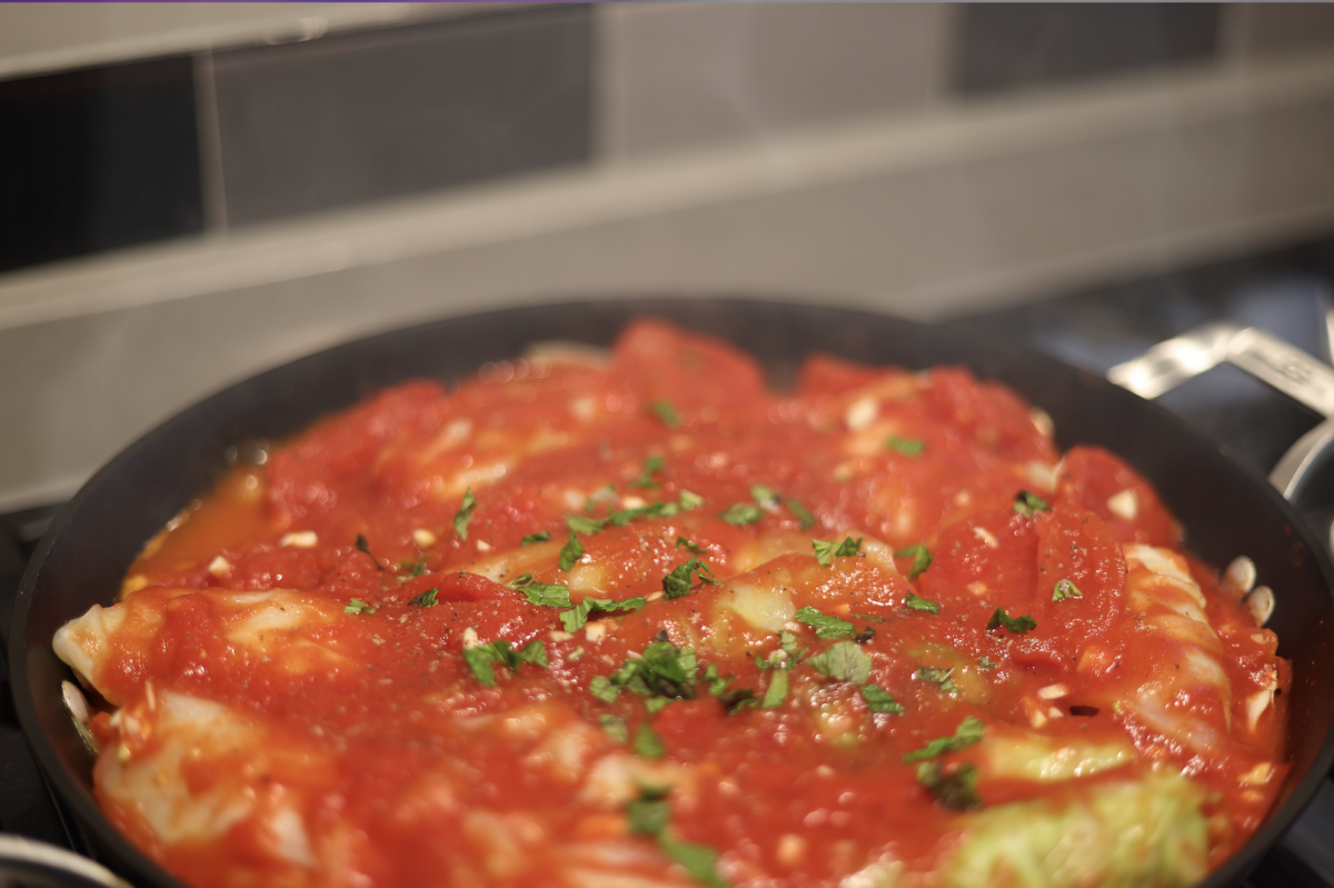 Cabbage rolls simmer in a pot. The Anton family Immigrated to the U.S. in 1904 and has maintained their Lebanese recipes. “Knowing I’m cooking for family and friends always adds extra love to the pot,” Sophia said.