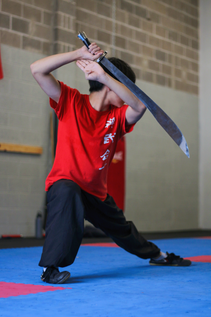 Sophomore Jin Zhang performs his routine at the start of class, which can take up to two minutes. Zhang has performed at many cultural events like the Festival of Nations in preparation for upcoming competitions. Zhang utilized the skills and his experience from the cultural events, he feels more prepared for the upcoming competitions. “I am taking more private classes with my coach instead of a big class,” Zhang said. 