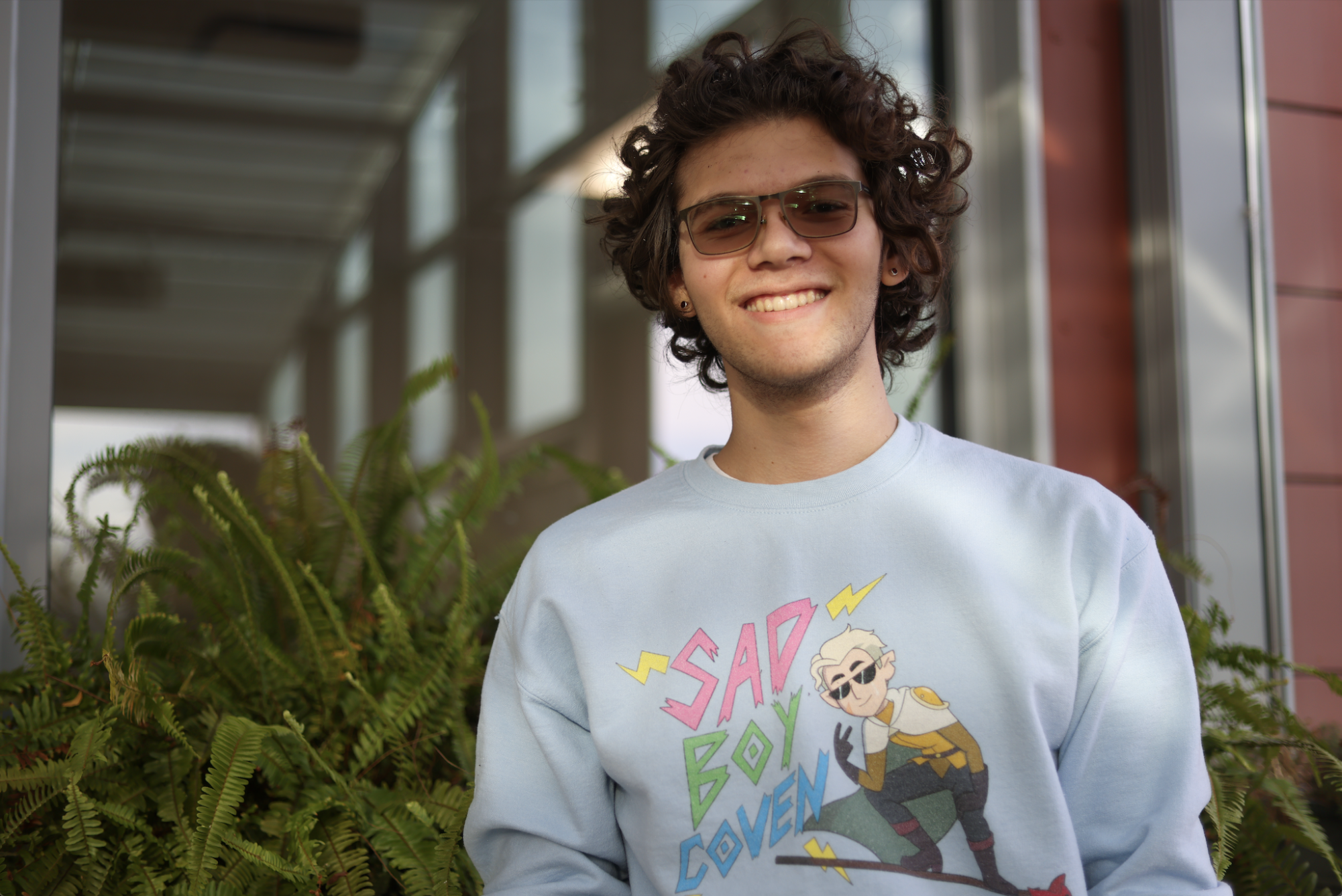 Senior Gabe Bernstein works in the school greenhouse. This past summer, Bernstein explored various research opportunities to finally recognize what science fields he would like to pursue. "[Research in the summer] helped me narrow down my focus for what I wanted to go into," Bernstein said. "I know which sides of plant science and ecological studies I didn't like and which ones I did."