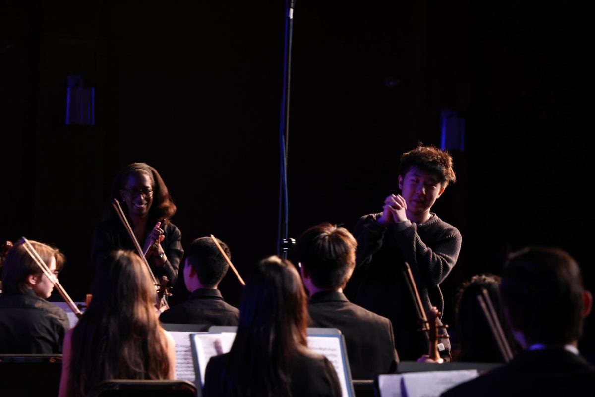 Junior Yueheng Wang's piece, “Of Mountains and Seas,” is played by Ladue High School's top orchestra and band classes April 4. He wrote it in June 2023, drawing inspiration from an ancient Chinese novel titled “Classics of Mountains and Seas.” Wang’s parents and compositional teacher sat in the audience to support him throughout the performance. Many of Wang’s friends, who played the piece, also showed their encouragement. “A lot of my friends were really enthusiastic — [especially] the wind players,” Wang said. “A lot of them would come up to me, [would] want me to help them and would come to seminar every day. It was such a group effort, and it felt like a relief that [the piece] was in good hands.”