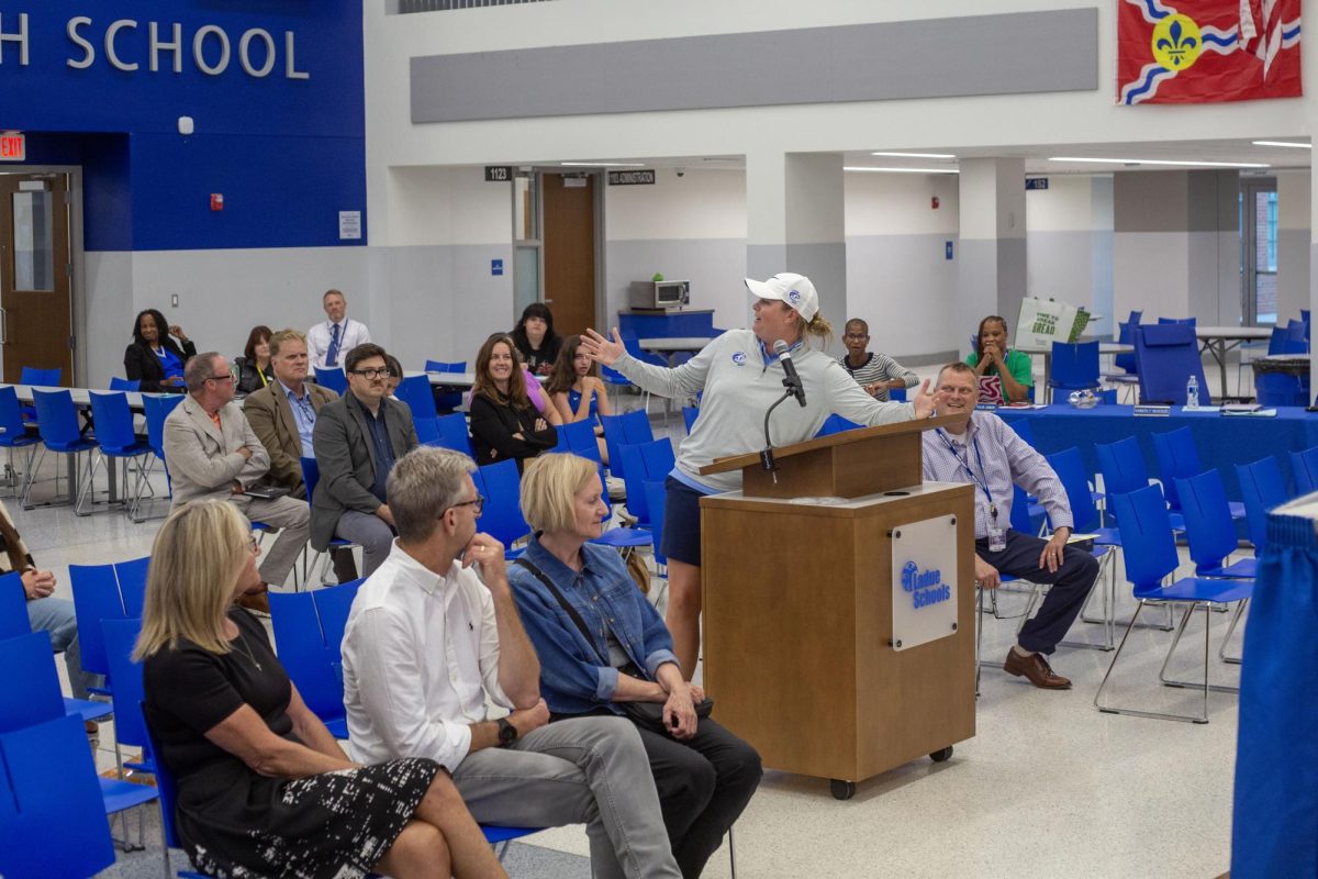 History teacher Riley Keltner receives September Excellence in Education Award at Sept. 25 school board meeting. 