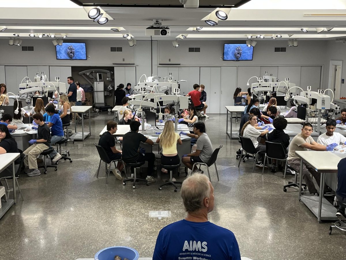80 AP psychology students dissect sheep brains in a lab at Saint Louis University's Young Hall