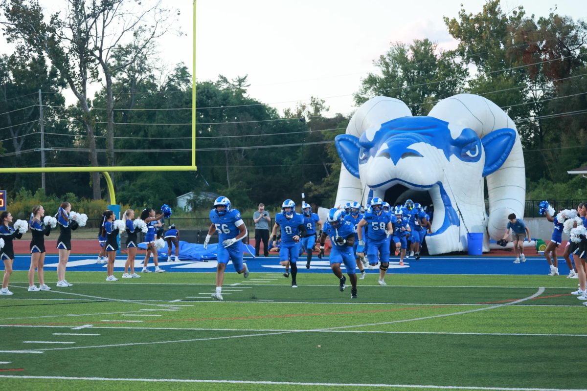 The Ladue Football Team runs out onto the field for their game. Ladue played Hazelwood East Sept.19 and won 17-6. “Heading into that game, Hazelwood was a top 10 Class 5 team in the state, and they were scoring over 40 points a game,” Varsity Assistant Coach Jace Mortimer said. “They also had only allowed six points all season. It was a testament to our defense, only allowing [them to score] six points.” 