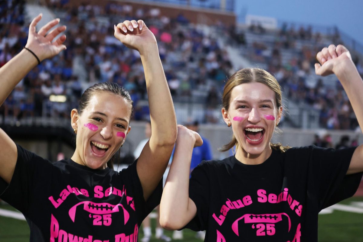 Seniors and juniors play against each other at the yearly Powderpuff game Sept. 29. The seniors won 24-0. "It was a good win for the seniors and I'm happy everyone performed well," Sophie Miller (12) said.