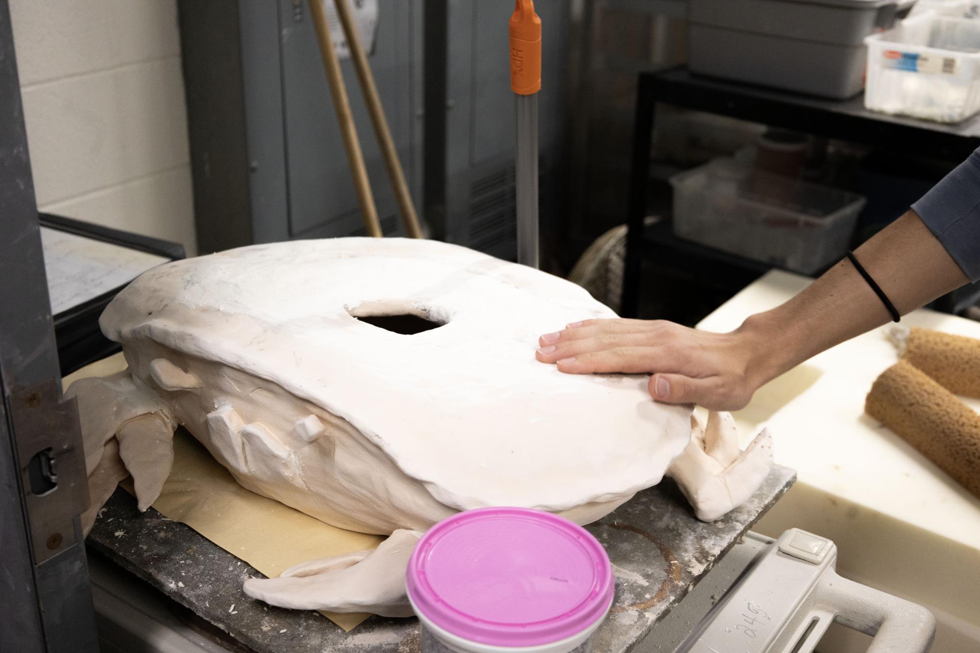 Ceramics students polish their projects Oct. 28