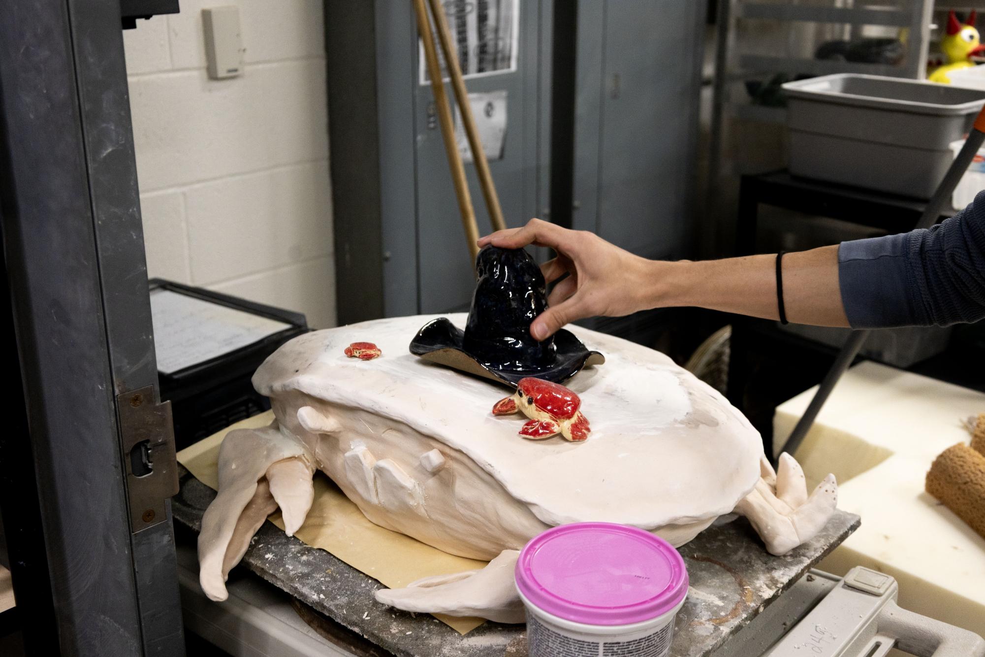 Ceramics students polish their projects Oct. 28