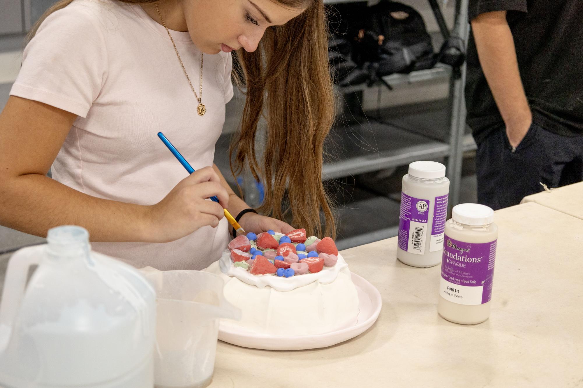 Ceramics students polish their projects Oct. 28