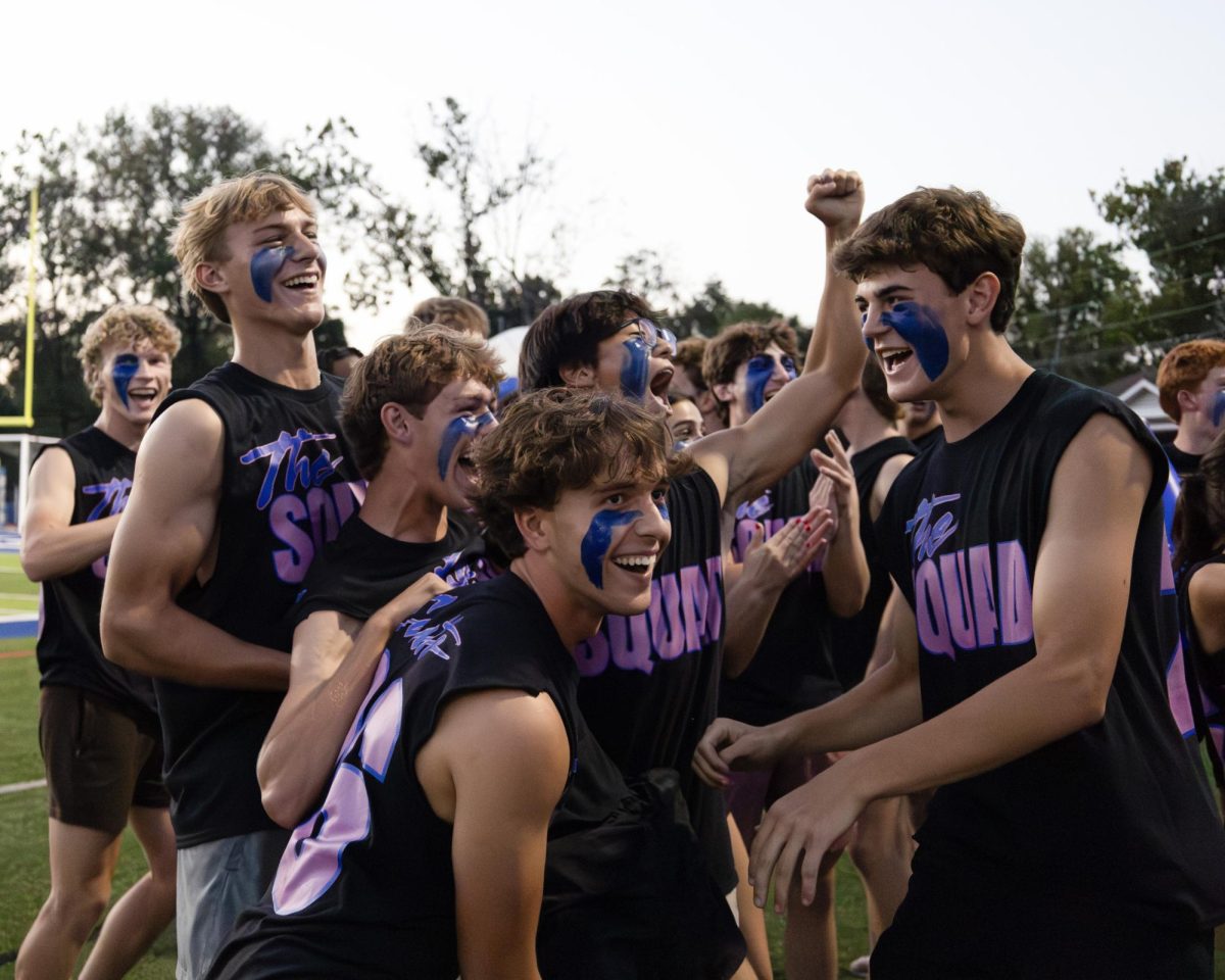 Students and staff gather together as the annual Powderpuff game commences Sept. 29. Seniors came out victorious over the juniors 24-0. "I was just happy to be with my friends," Kira Cornell (12) said. "It was fun and a good way to start homecoming week."