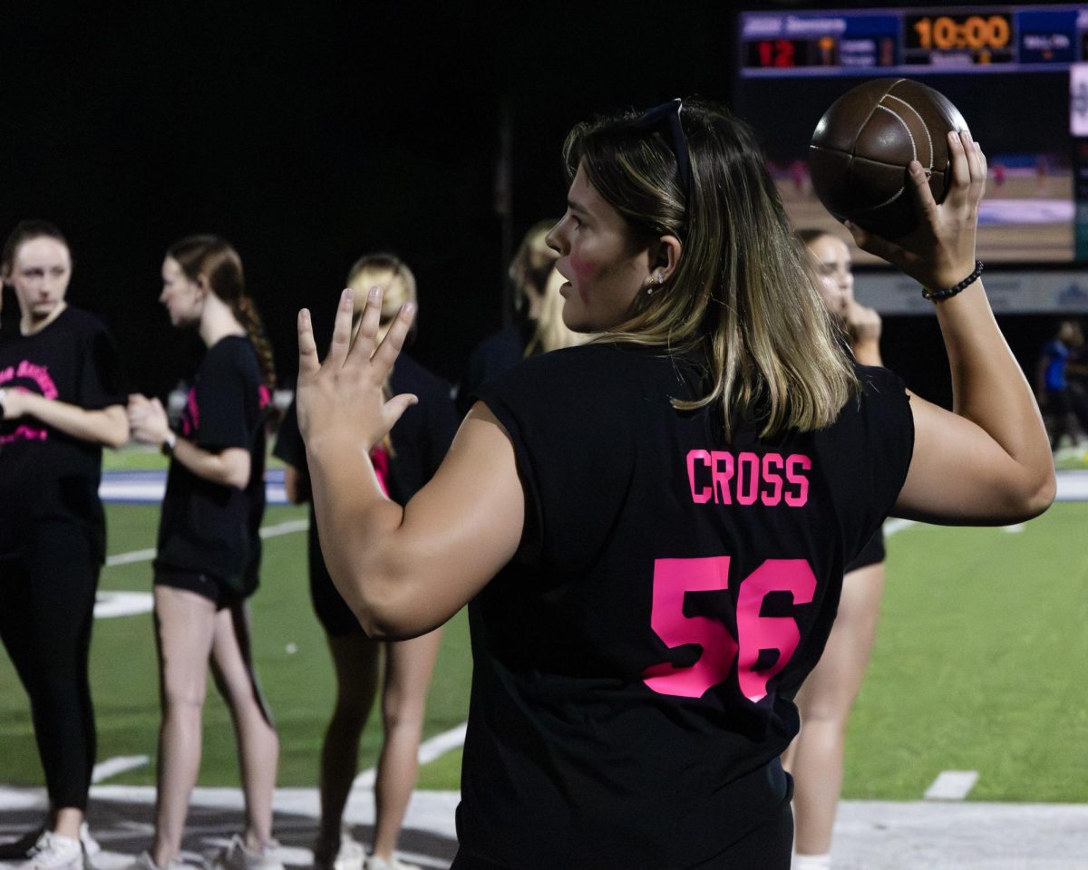 Students and staff gather together as the annual Powderpuff game commences Sept. 29. Seniors came out victories over the juniors 24-0. "