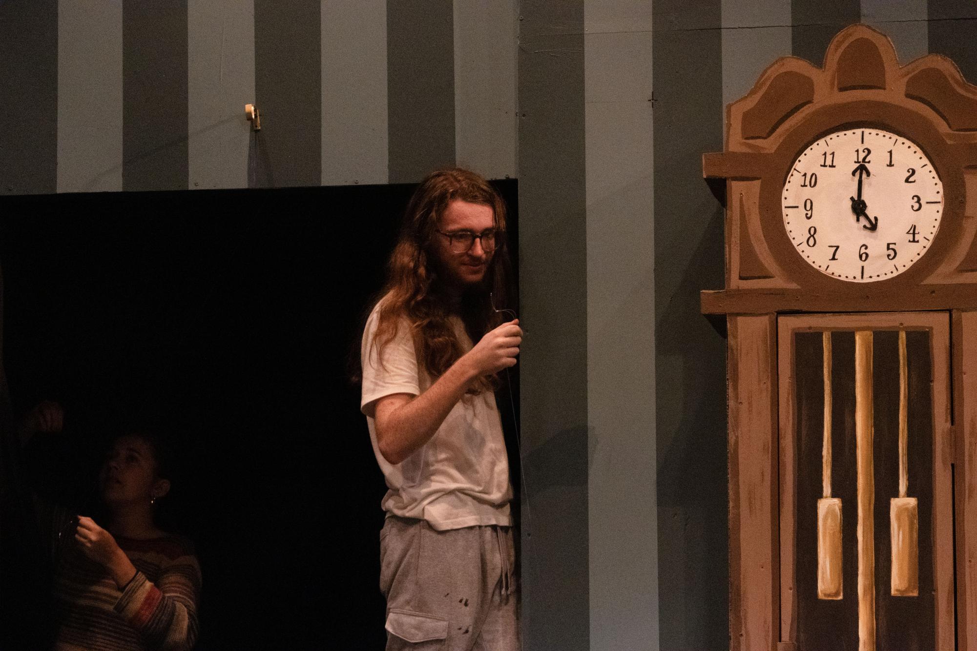 Students set up The Play That Goes Wrong stage Oct. 16