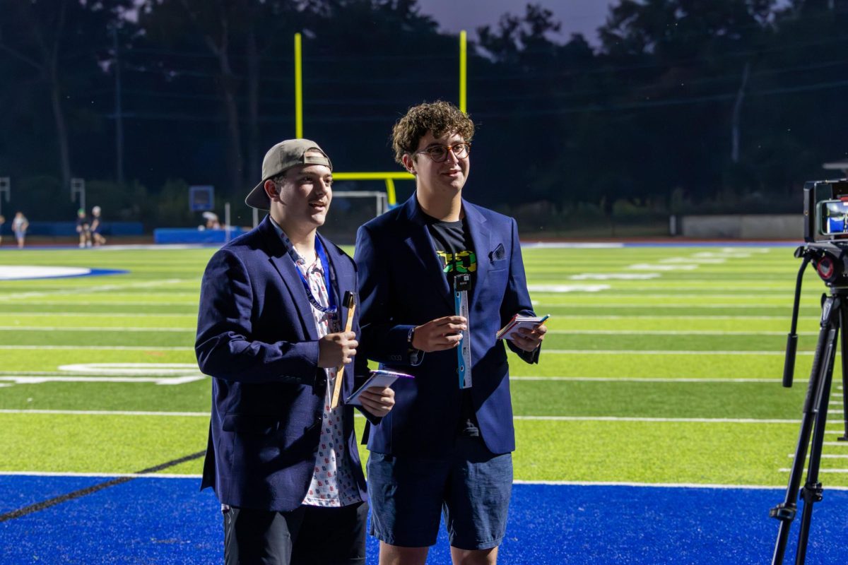 Ladue Sports Net staff members Ari Litt (12) and Dylan Scissors (12) do a halftime report for the Girl’s Varsity Field Hockey game against St. Joseph’s Academy Sept. 11. Litt and Scissors have done halftime reports for nearly all Ladue sports games this year. “We want to be the source for all things Ladue Rams sports,” Multimedia Sports teacher Ross Green said. “We want to grow as a class, grow as a media outlet and become better videographers and journalists along the way.”