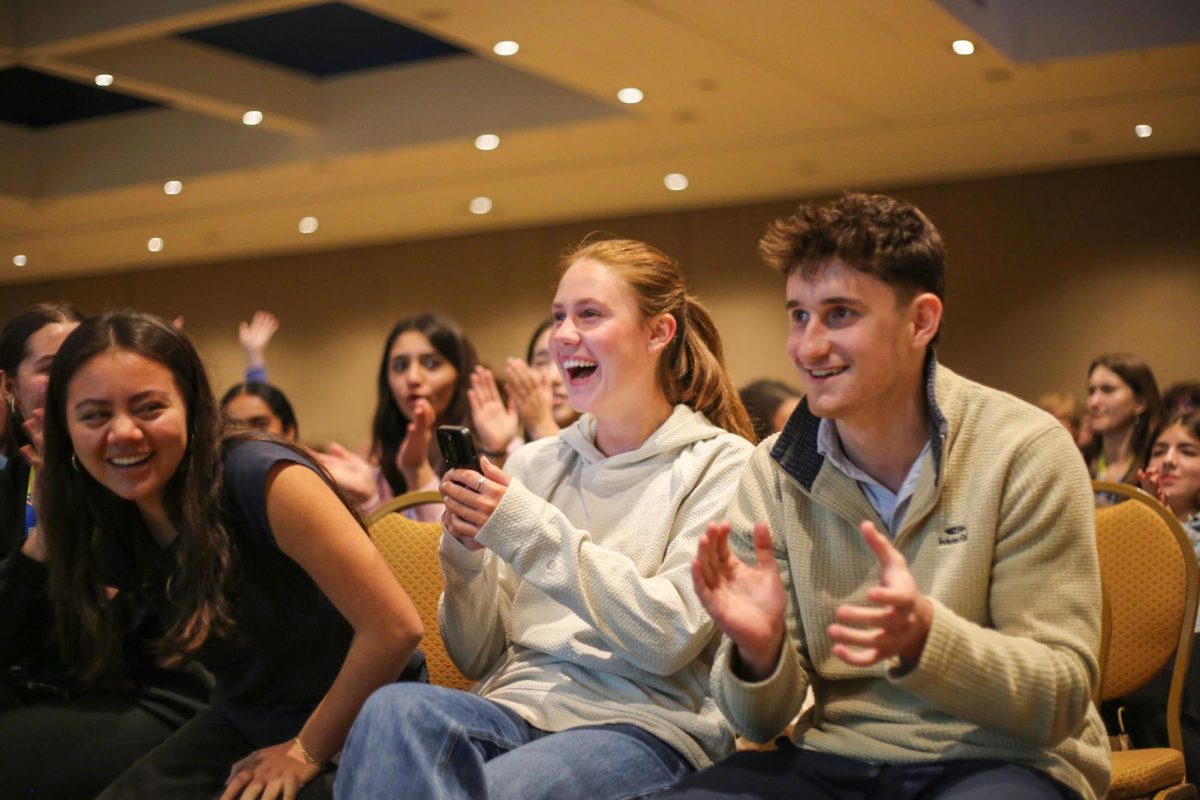 Seniors Madeline Awad, Mason Eastman and Josh Devine react as Awad and Devine place third in Infographic Design for their spread, "Ready, Set, Pickle" over pickleball. The three joined Ladue Media during their sophomore year and have attended several conventions together, winning various awards. 