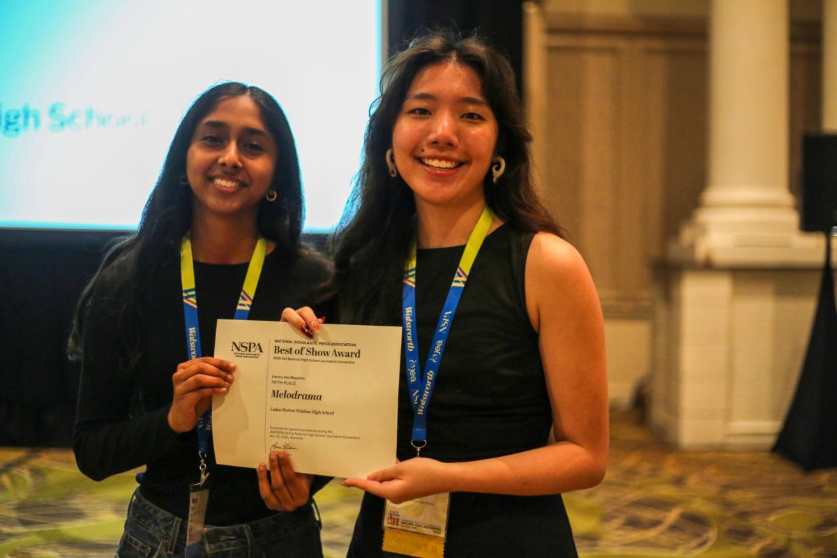 Seniors Maya Mathew and Celina Zhou stand with the fifth place certificate for Melodrama, the literary magazine. The two were junior editors in chief of the magazine last year and are the current editors in chief this year. 