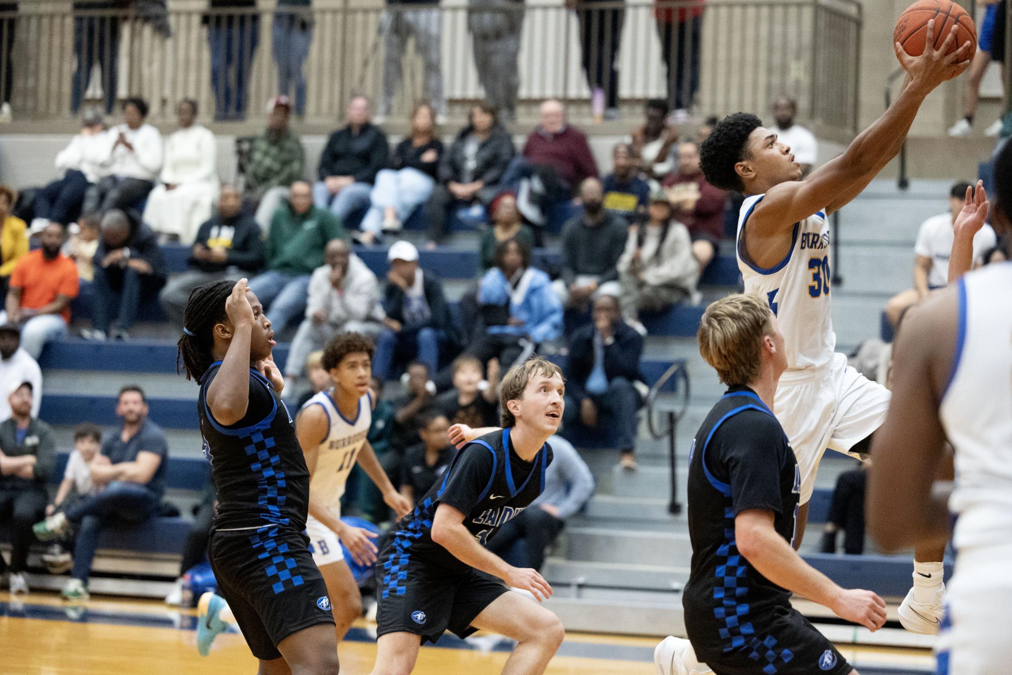 Boys varsity basketball defeats John Burroughs Nov. 20