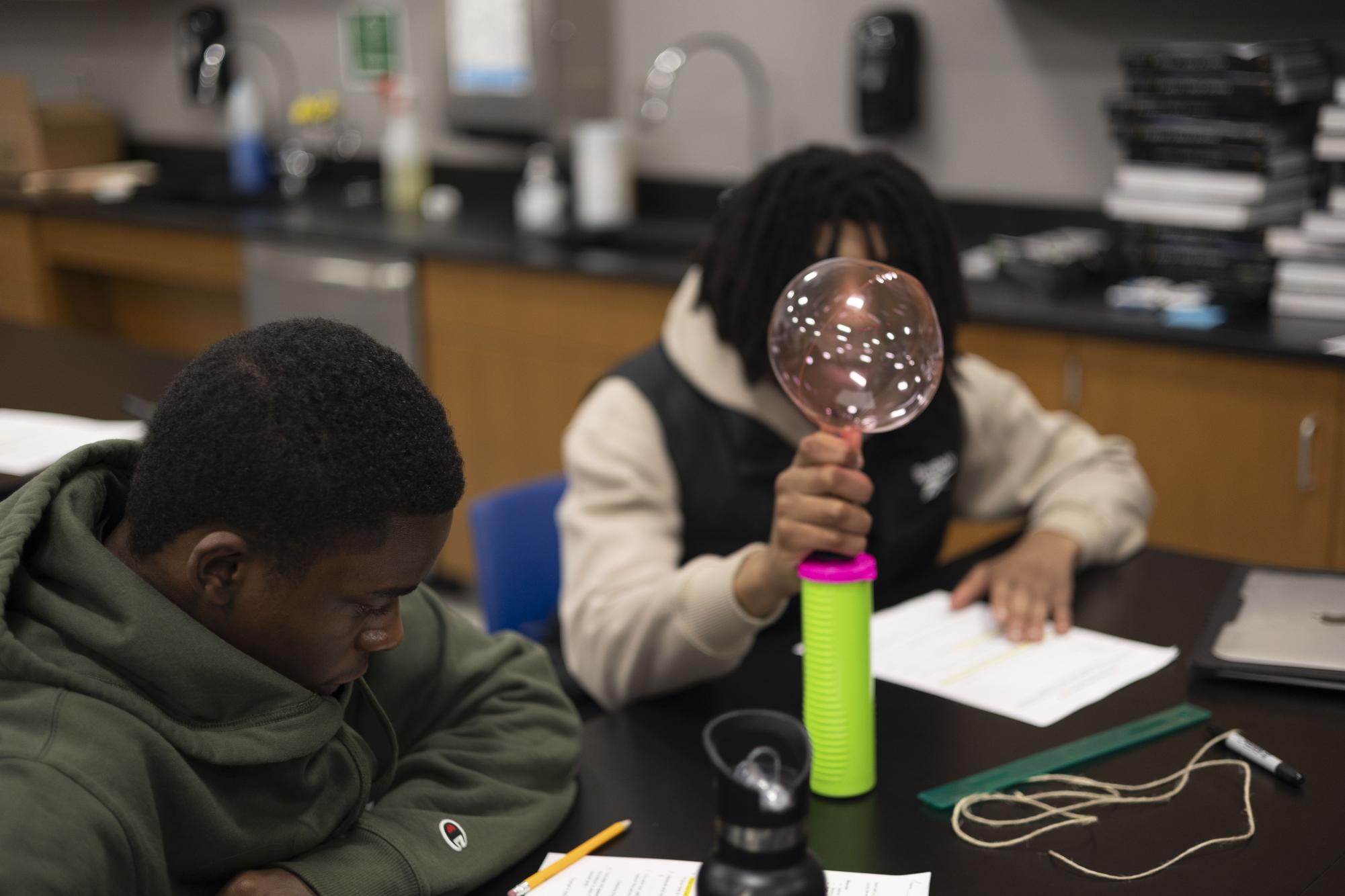 Astronomy students conduct big bang lab