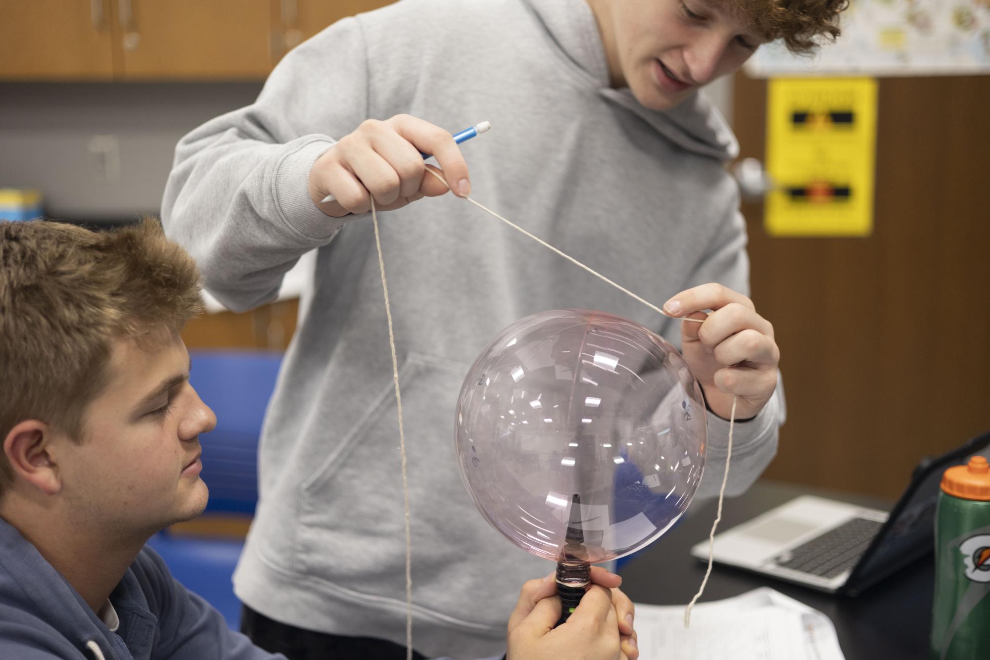 Astronomy students conduct big bang lab