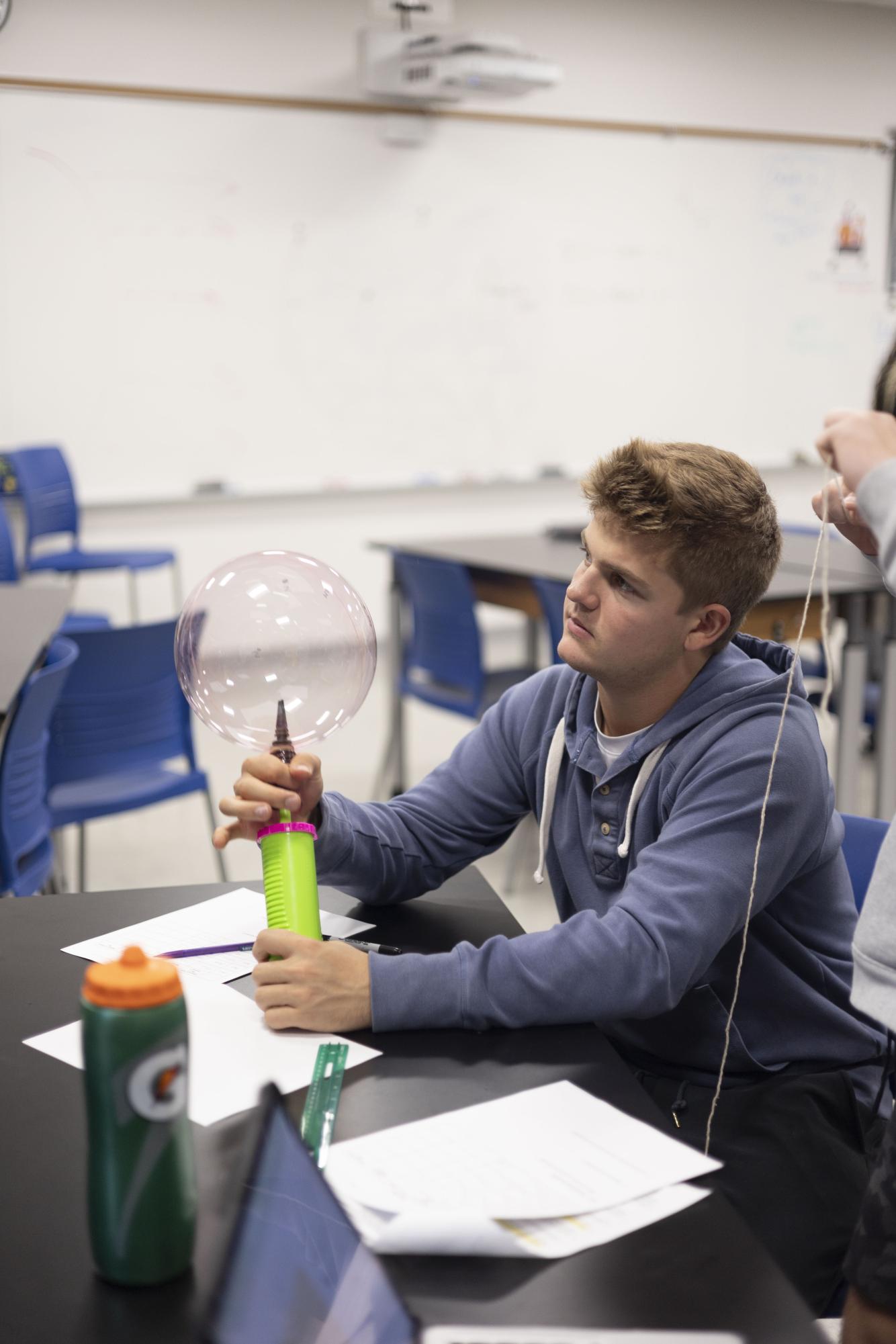 Astronomy students conduct big bang lab