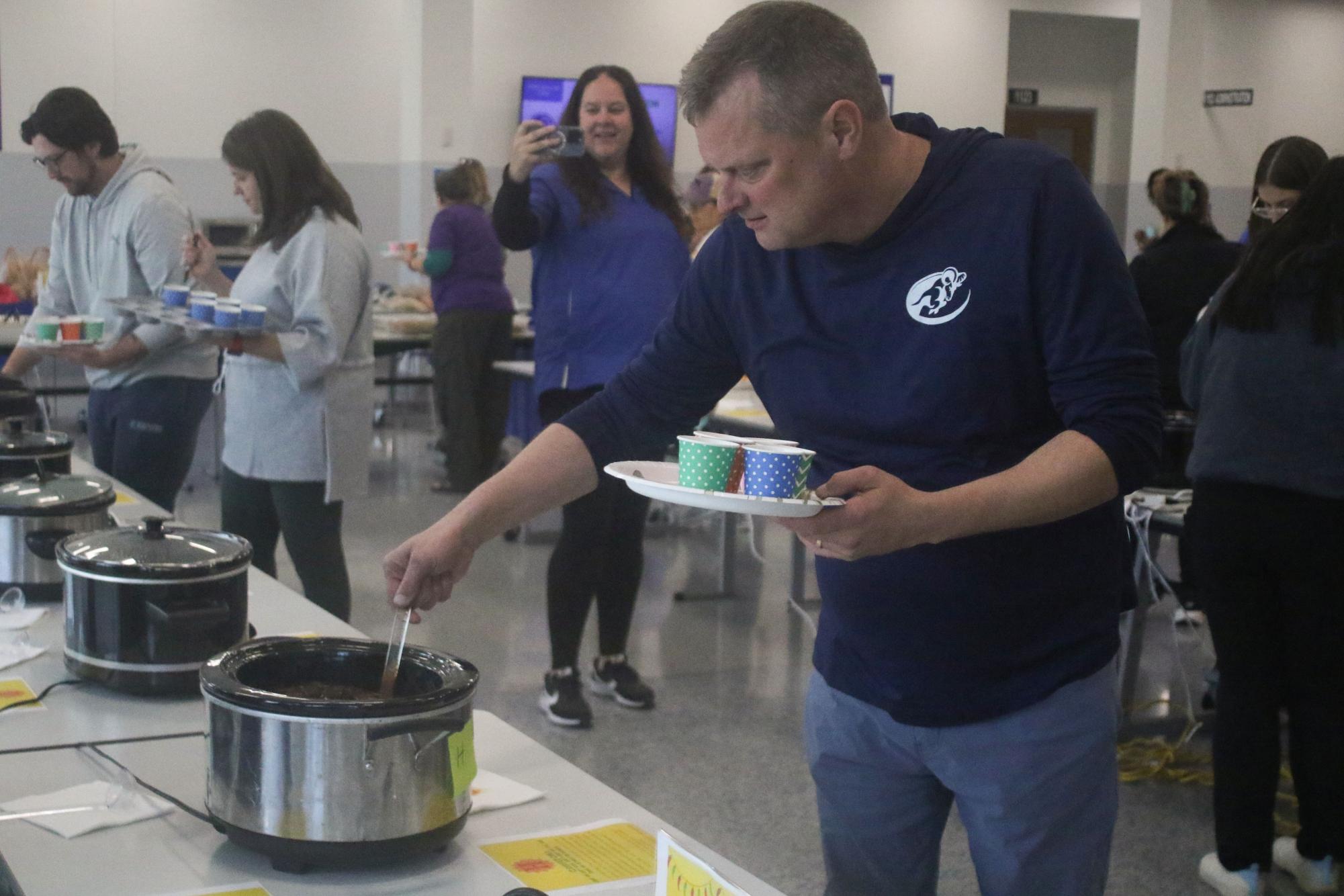 Staff members enjoy annual chili cook off Nov. 4