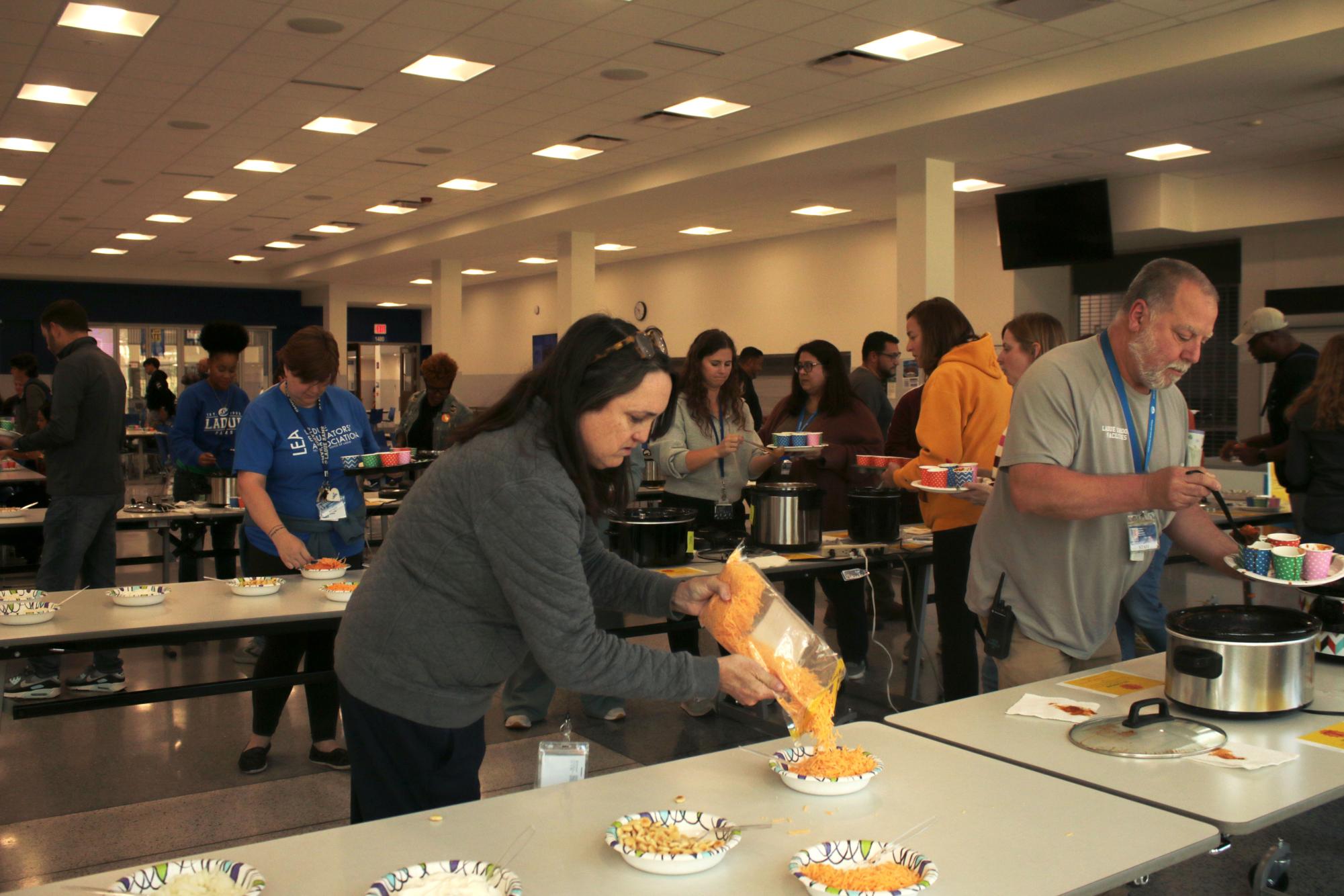 Staff members enjoy annual chili cook off Nov. 4