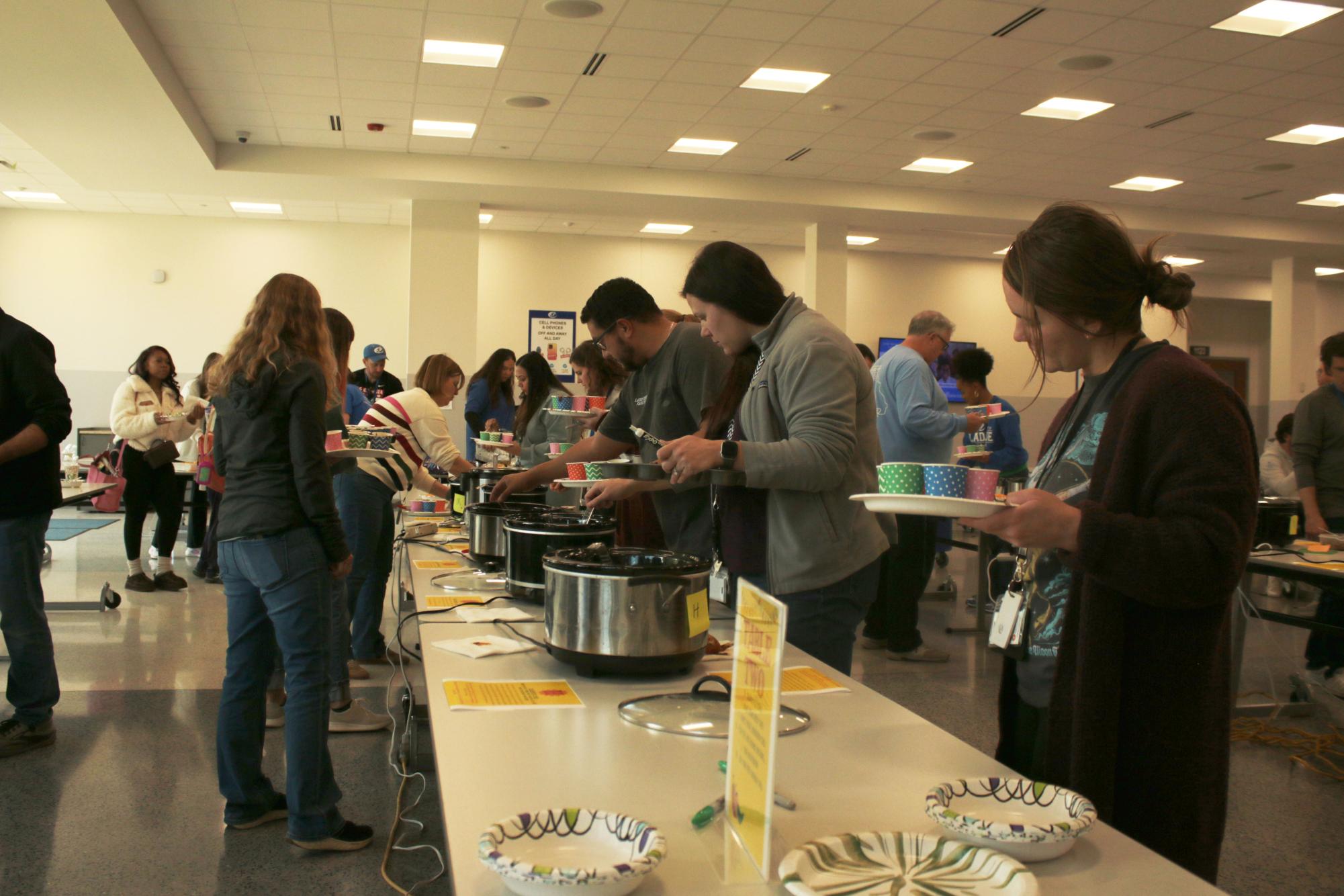 Staff members enjoy annual chili cook off Nov. 4