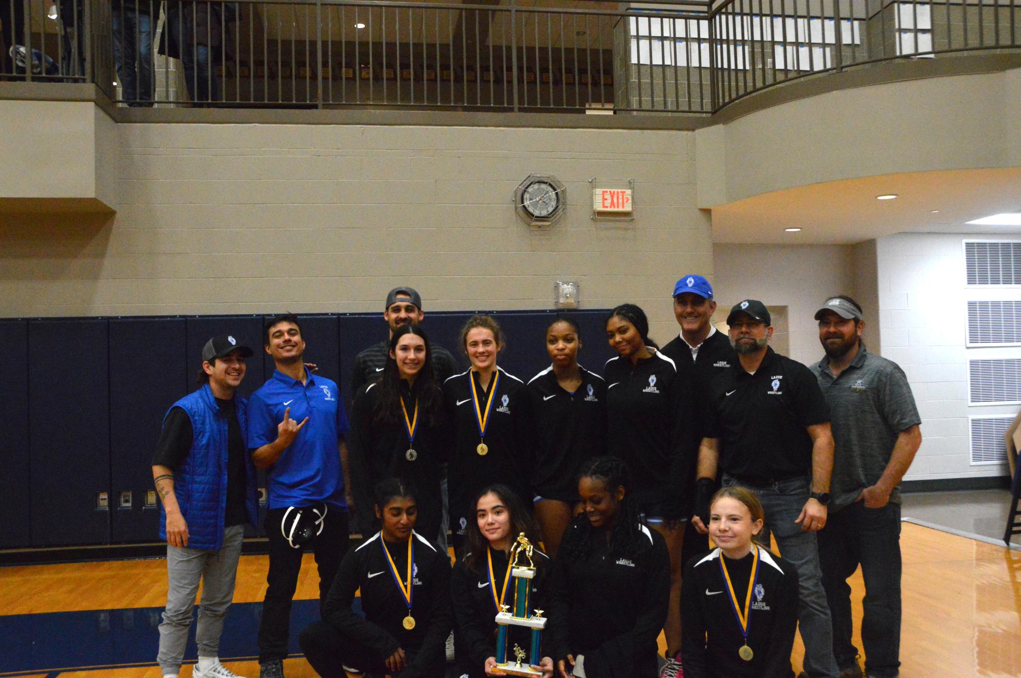 Varsity wrestling brings home trophies from the John Burroughs Tournament Dec. 5-6