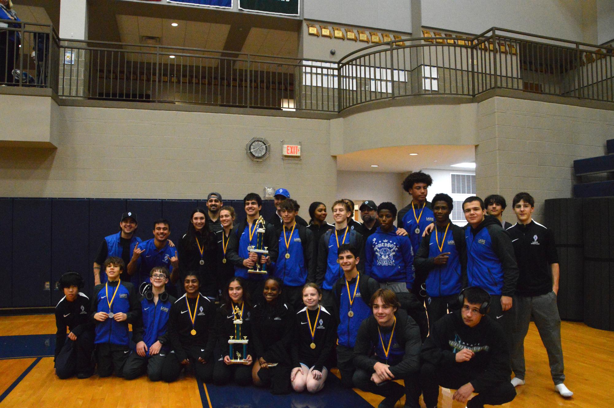 Varsity wrestling brings home trophies from the John Burroughs Tournament Dec. 5-6