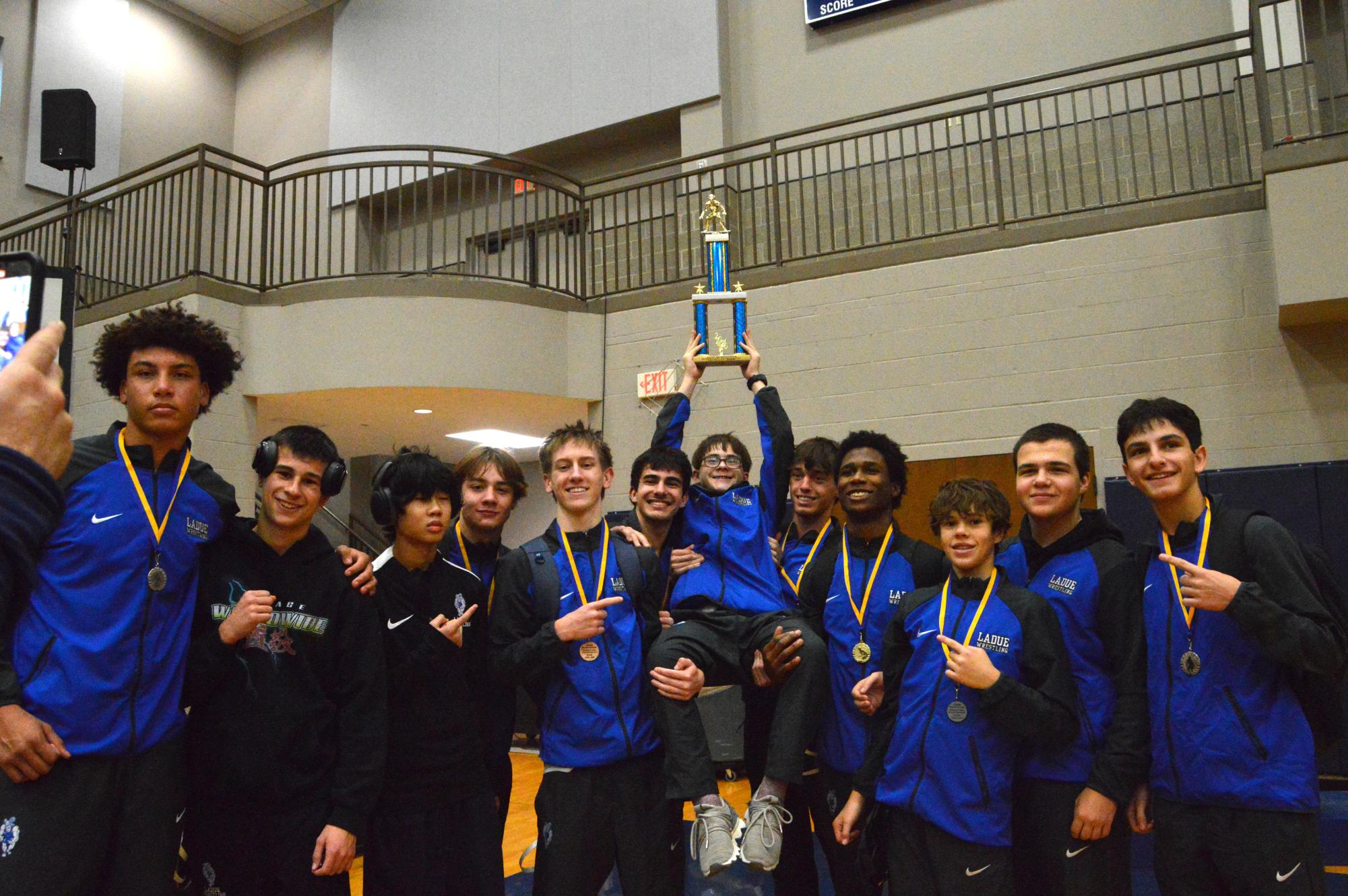 Varsity wrestling brings home trophies from the John Burroughs Tournament Dec. 5-6
