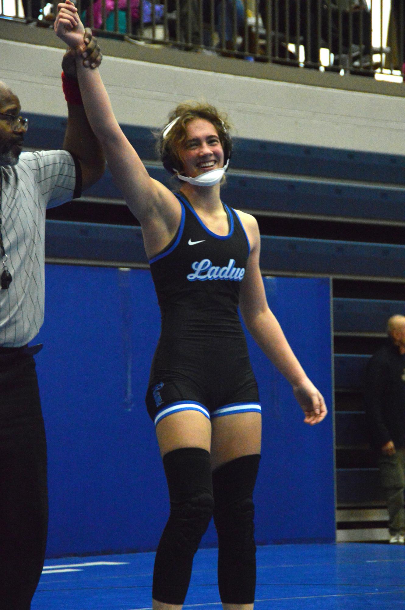 Varsity wrestling brings home trophies from the John Burroughs Tournament Dec. 5-6