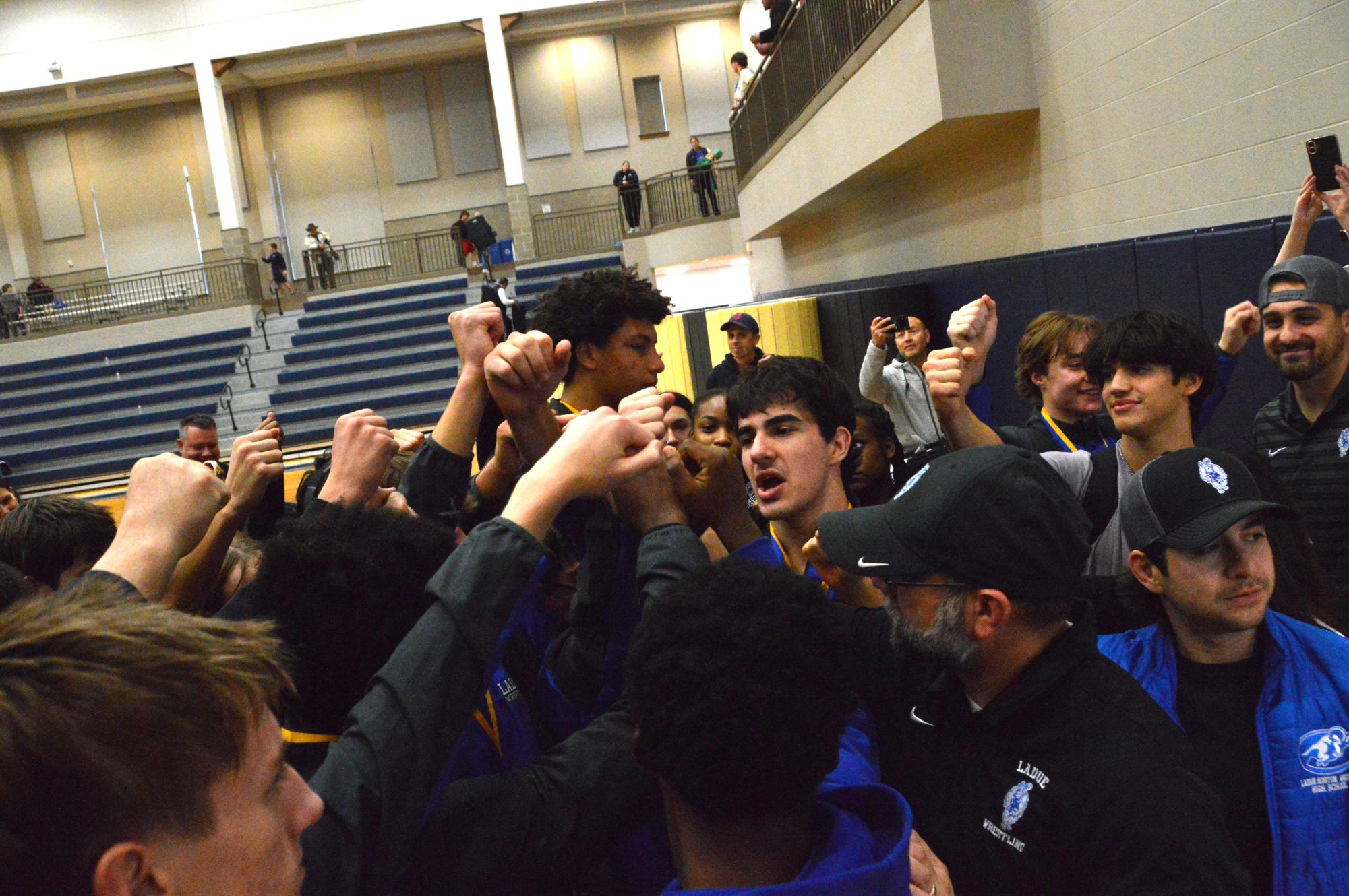 Varsity wrestling brings home trophies from the John Burroughs Tournament Dec. 5-6