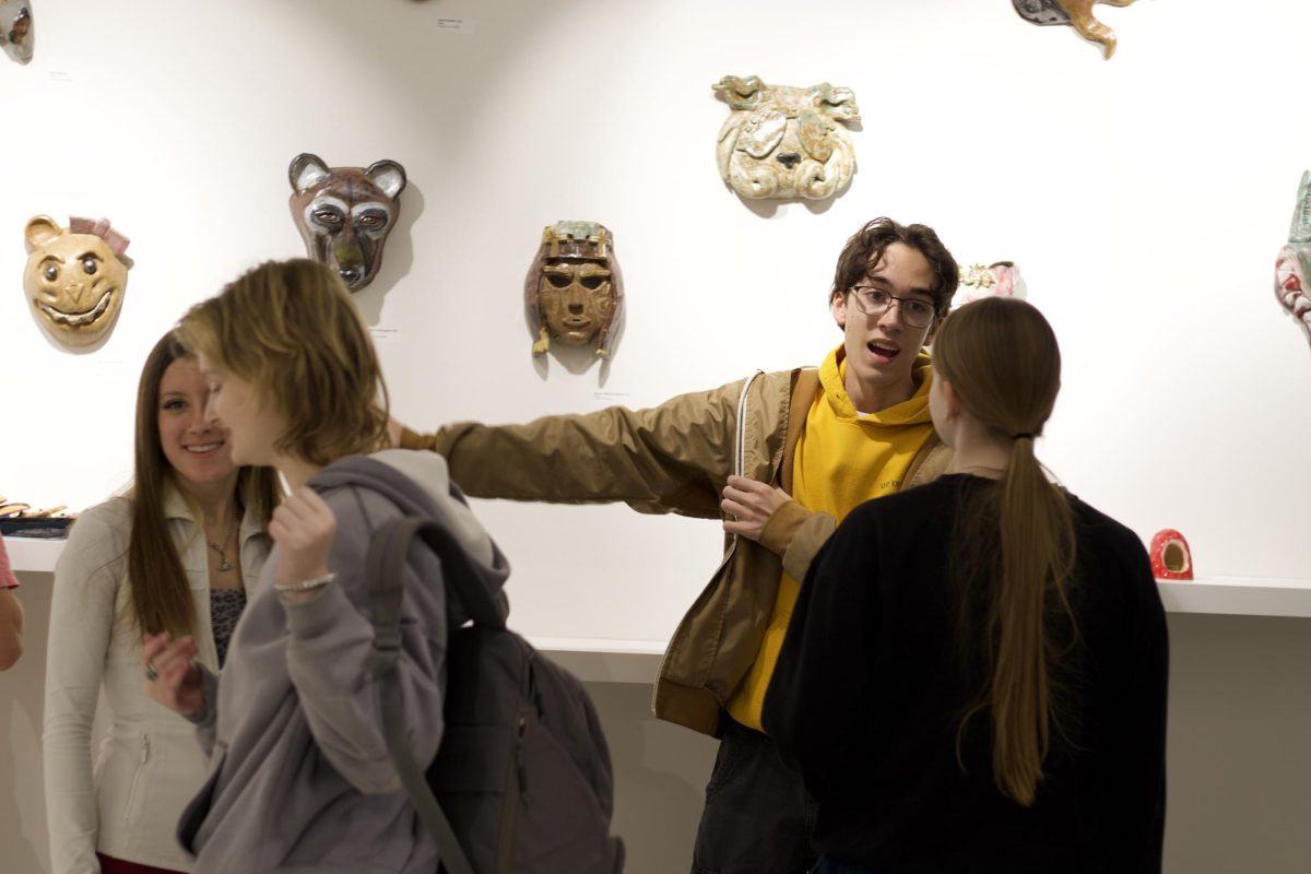 Students display ceramics artwork in the Spirtas art gallery Dec. 12. Xavier Stockmann (12) loves to see his peers work in the gallery. "I love to see it, and recognize different people's unique styles and patterns," Stockmann said. 