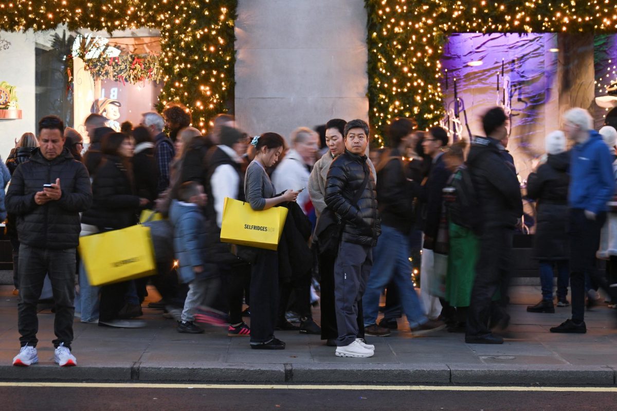 People walk on London’s Oxford Street ahead of Black Friday next week, in London, Britain, November 23, 2025. REUTERS/Jaimi Joy